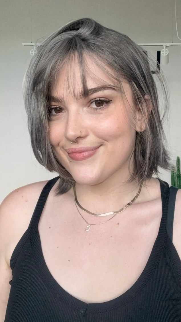 natural looking, heat safe bob  synthetic wig with salt and pepper grey hair.