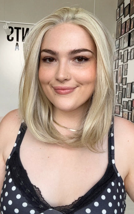 glueless petite synthetic wig for hairloss, hair parted to the side, buttery blonde long bob length.