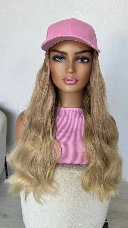 heat safe hat wig with soft blonde wavy hair.