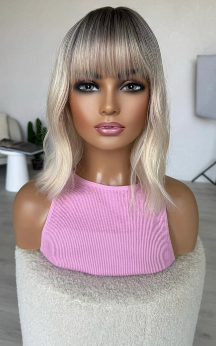fringe wig platinum ombre dark root, middle part.