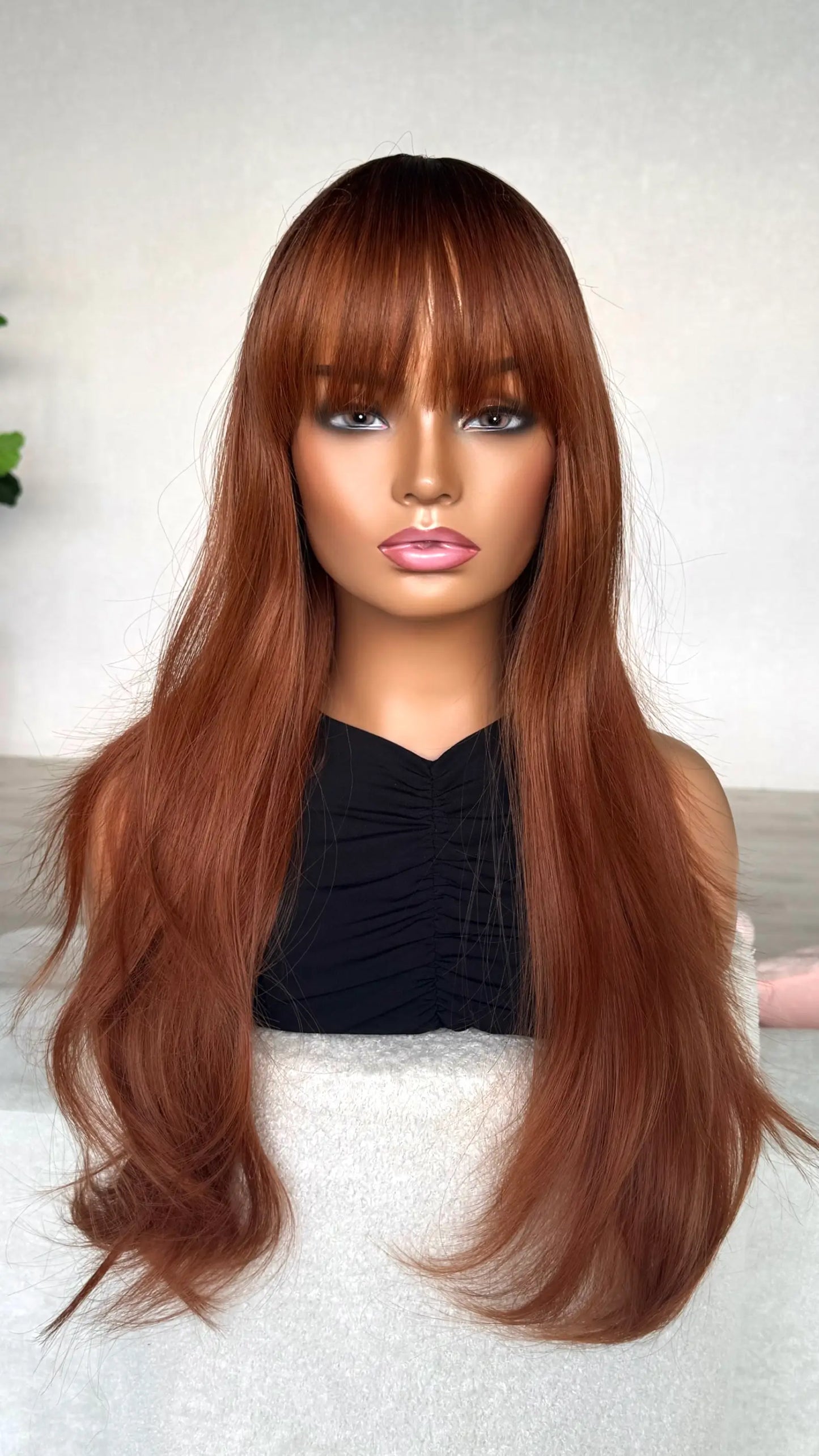 red copper synthetic hair, with fringe.