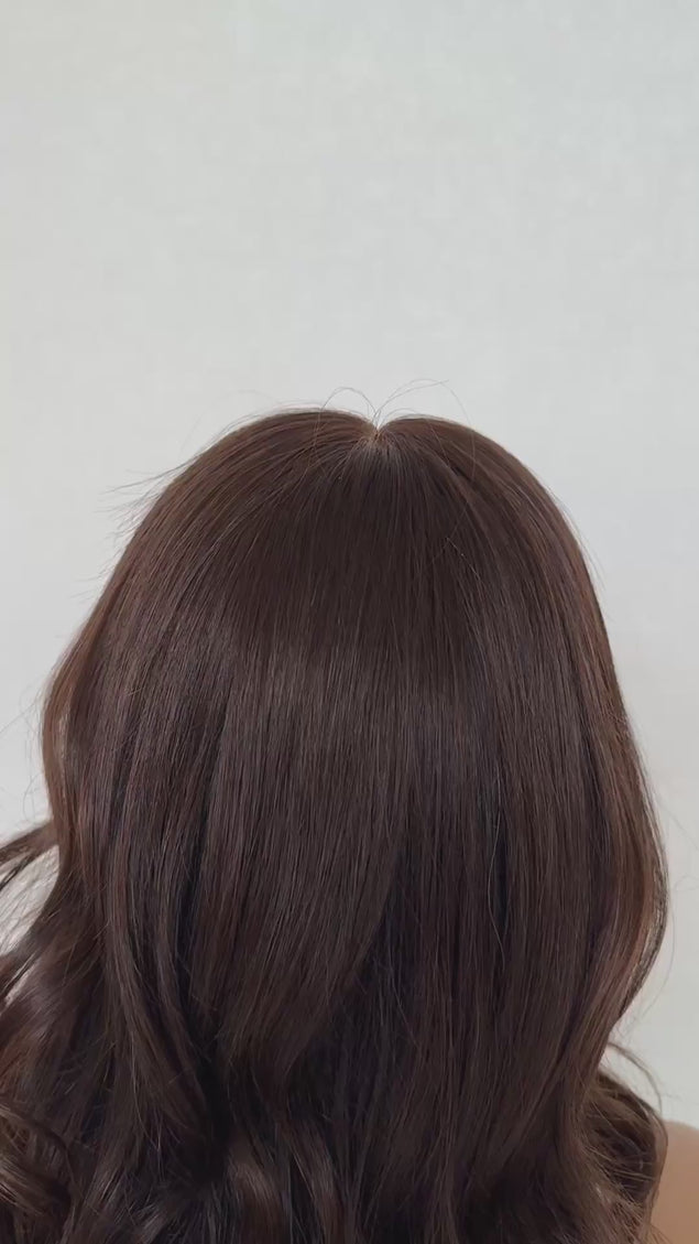 medical grade lace front human hair wig with dark brunette curled hair, gluless wig for everyday wear.