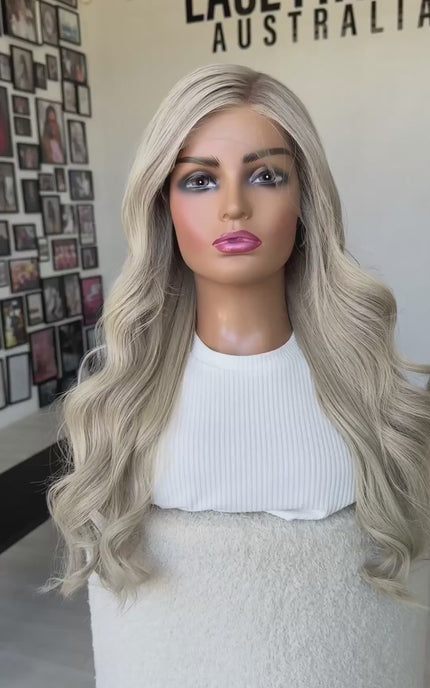 snow 26 inch platinum blonde with lowlights, lace front blonde wig curled hair, side part.