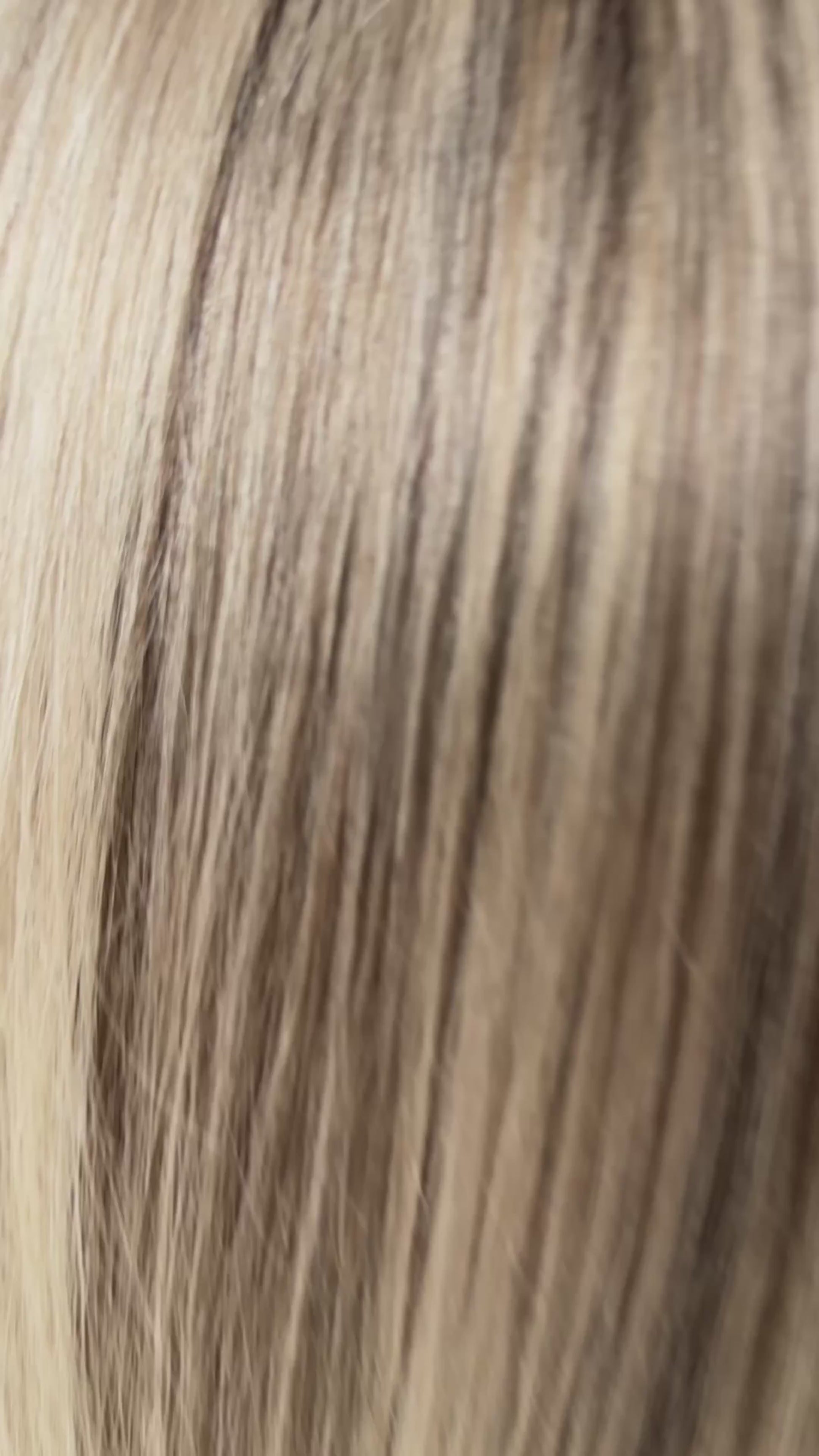 lowlighted blonde, multi dimensional with darker root. lacefront wig with brazilian remy hair, hand coloured in australia.