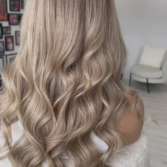 22 inch samantha colour, ash blonde hair curled. 22 inches.