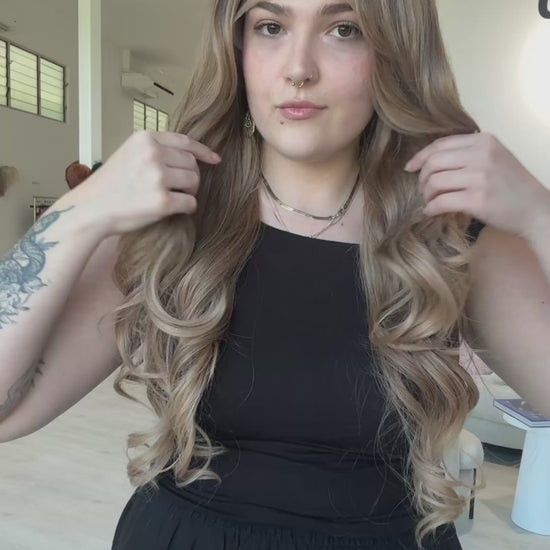 lace front long curly synthetic, heat safe, glueless wig cap with soft root to ombre brunette hair.