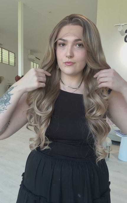 lace front long curly synthetic, heat safe, glueless wig cap with soft root to ombre brunette hair.