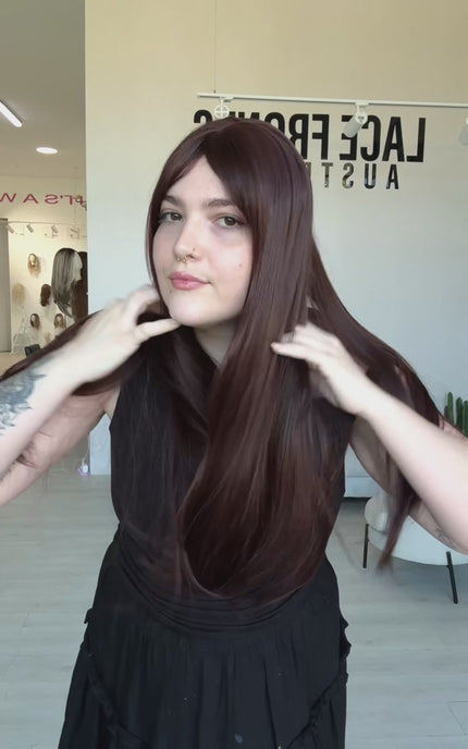 long length burgundy red hair synthetic wig with a glueless cap, long fringe and heat safe hair.