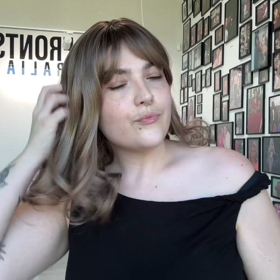 Dark ash champagne blonde wig, heat safe glueless synthetics australia, curled ends, middle part.