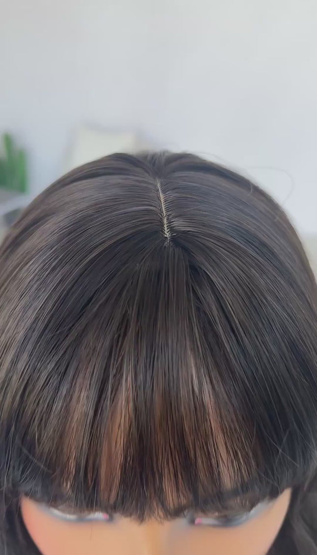 heat safe brunette synthetic wig, middle part with fringe.