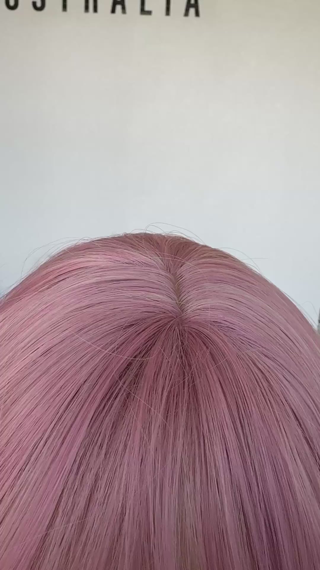 cotton candy pink synthetic video, middle part with fringe.
