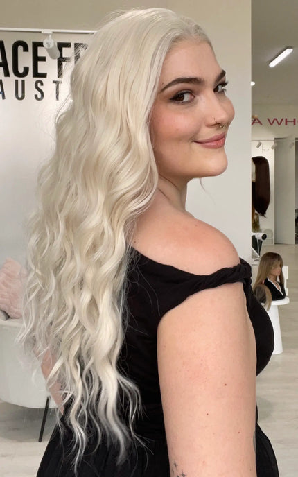 lace front white blonde wavy hair wig. glueless heat safe synthetic wig