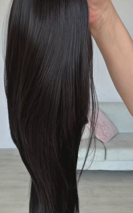 lace front glueless wig in dark black, with light layers throughout and lace ear to ear. perfect for daily wear, heat safe straight hair.