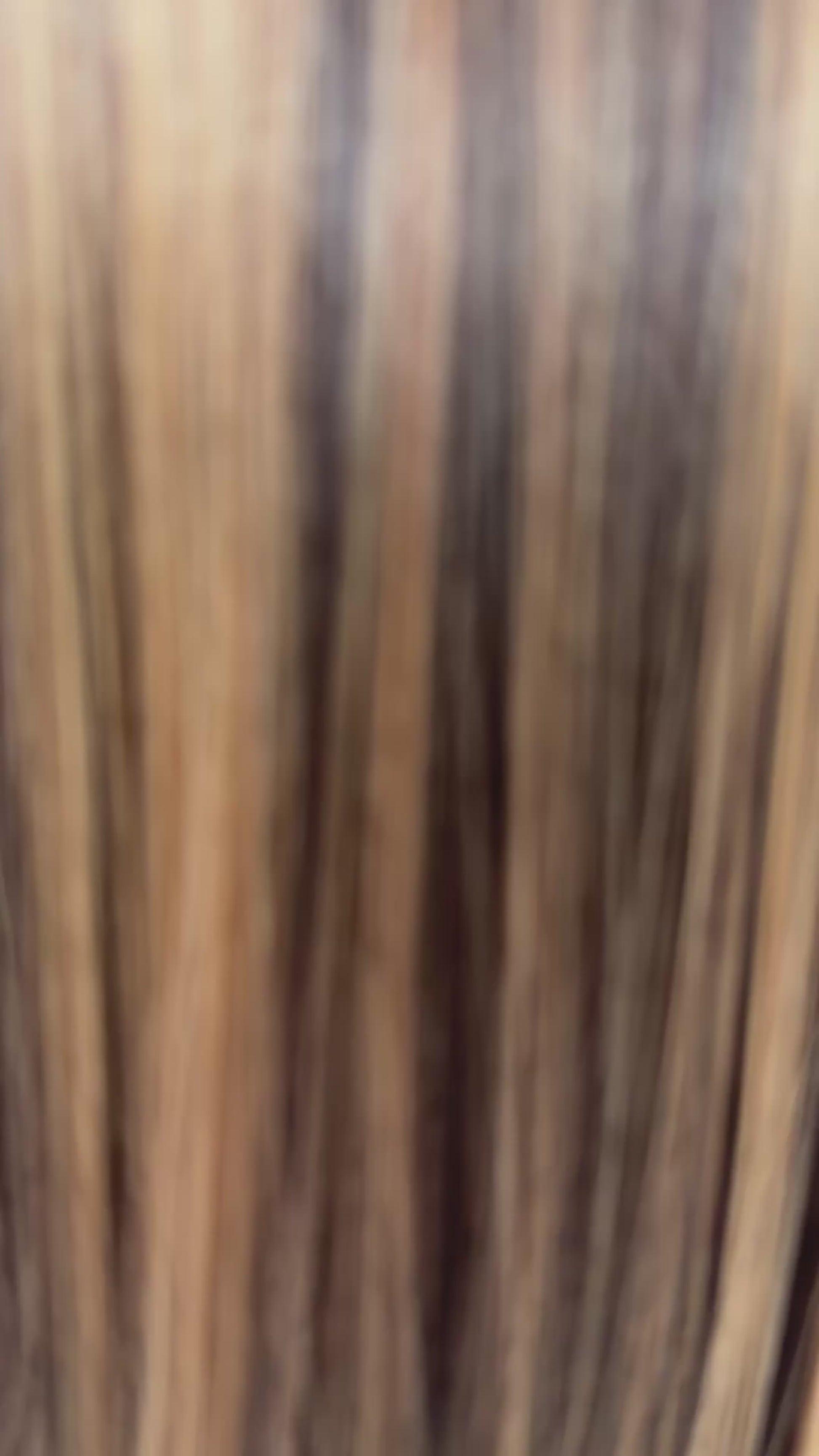 zoe wig synthetic video, brunette with golden highlights throughout, long bob length with fringe.