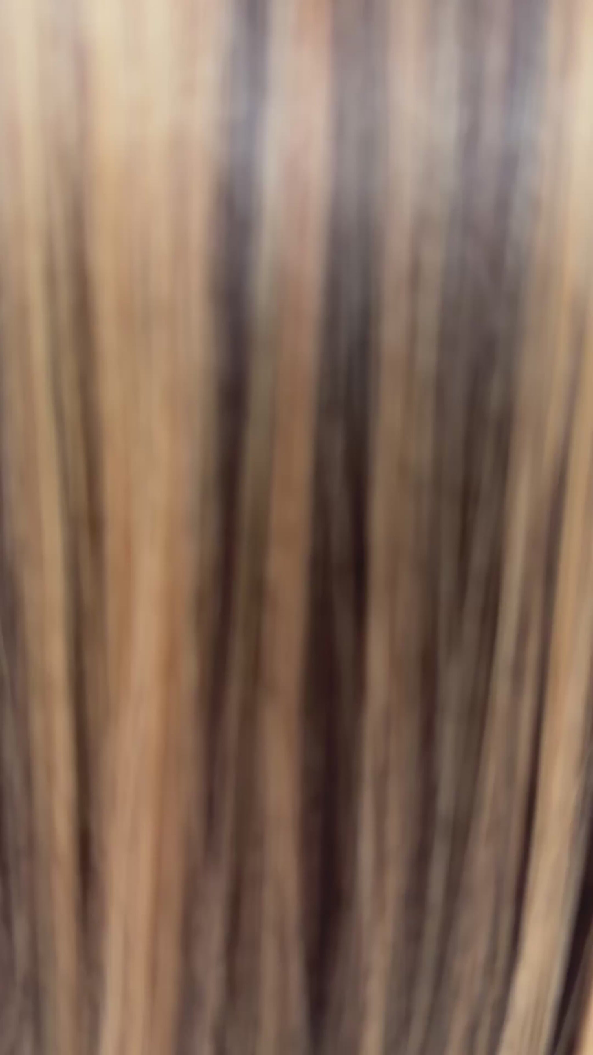 zoe wig synthetic video, brunette with golden highlights throughout, long bob length with fringe.