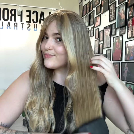 long wavy blonde hair, middle part with fringe. heat safe glueless synthetic toppers australia.