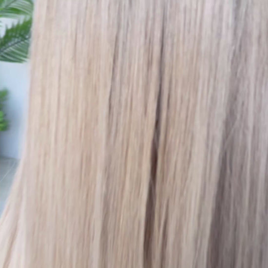 24 inch lacefront, human hair, long ash blonde with root. 