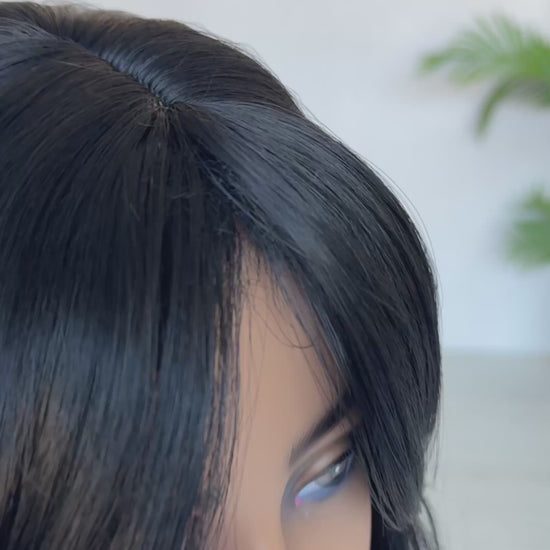 nova black synthetic with curtain bangs and layers, middle part.