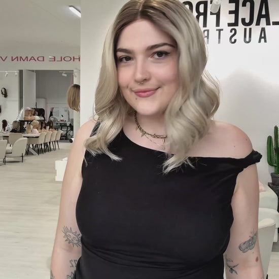 glueless ash blonde wig with darker root, wavy heat safe hair. ready to wear synthetics australia.
