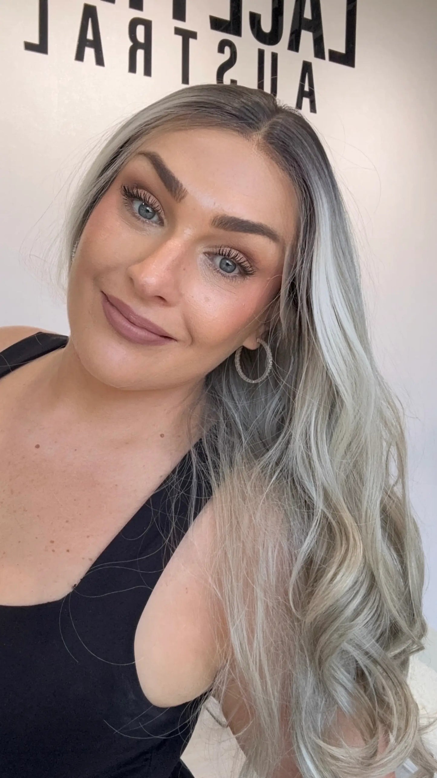 heat safe, glueless wig australia, darker root to ash blonde hair, curled hair.