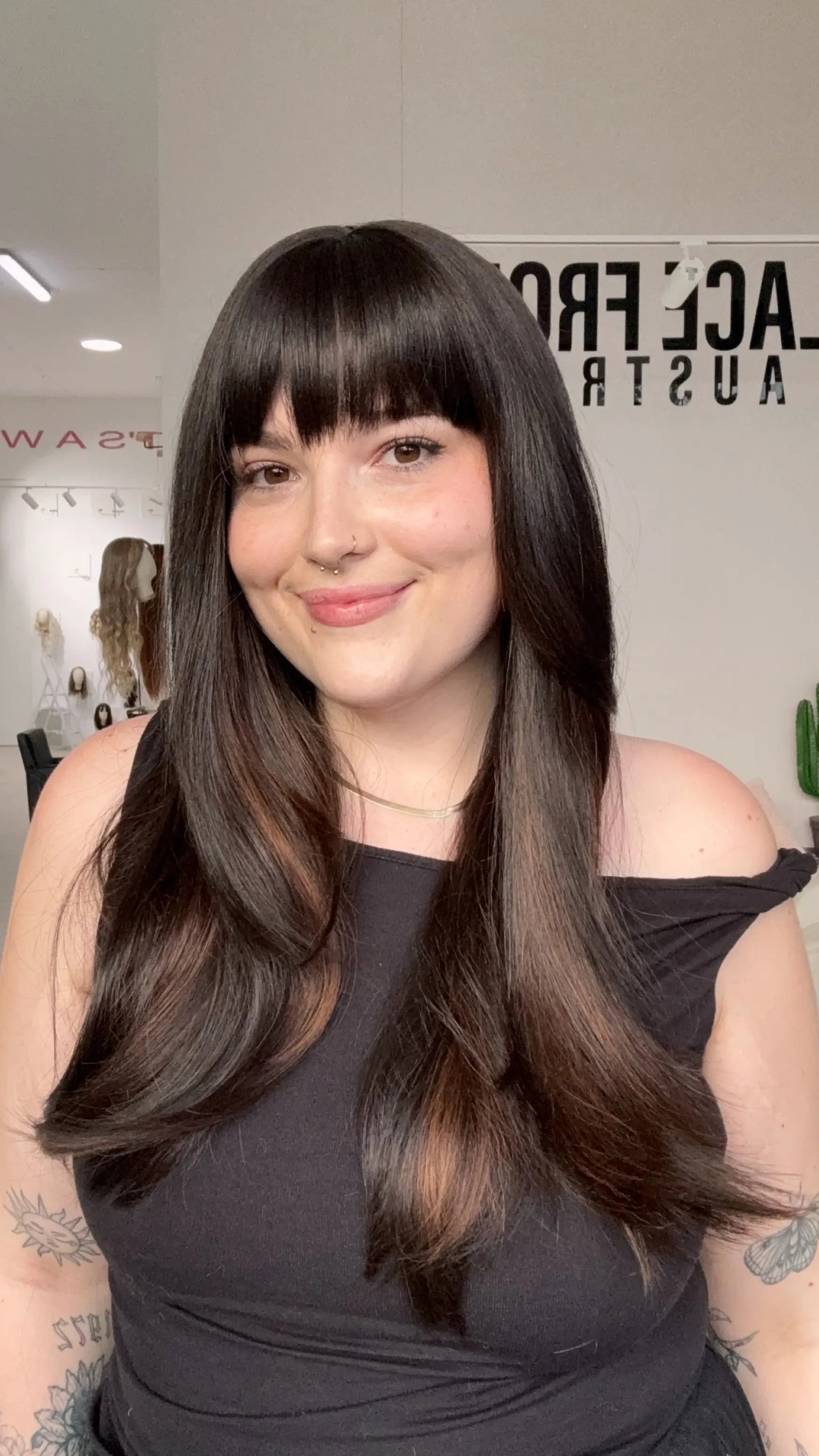 natural looking brunette fringe synthetic with a beginner cap.