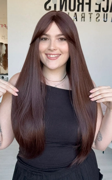 glueless synthetic deep red brown long fring wig with middle part.
