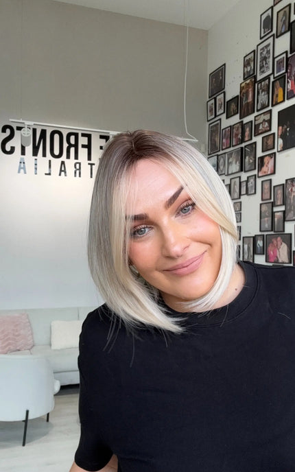 short blonde icy bob synthetic wig with glueless cap for easy everyday wear.