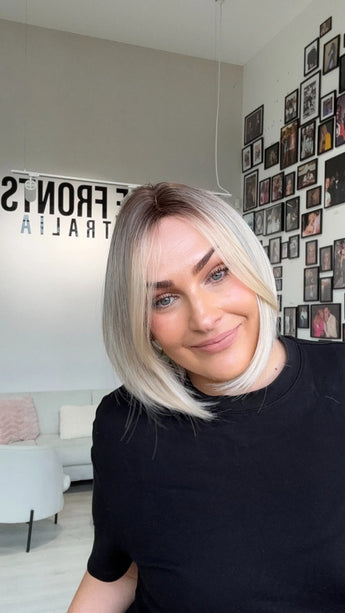 short blonde icy bob synthetic wig with glueless cap for easy everyday wear.