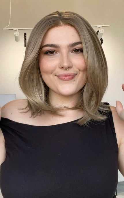 realistic looking glueless lace front bob wig with dark blonde hair colour.