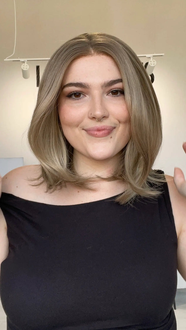 realistic looking glueless lace front bob wig with dark blonde hair colour.