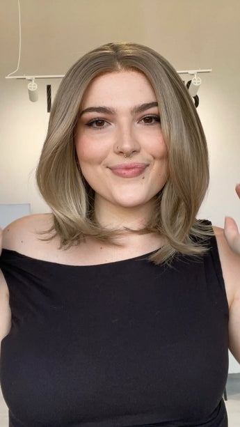 realistic looking glueless lace front bob wig with dark blonde hair colour.