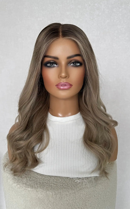 lace front wig, ash blonde, darker root with face framing highlight.