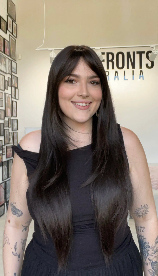 dark brunette hair wig with layered hair, middle part with long fringe.