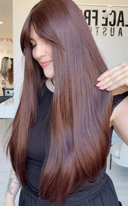 a natural looking red brunette synthetic wig with heat friendly fibres.