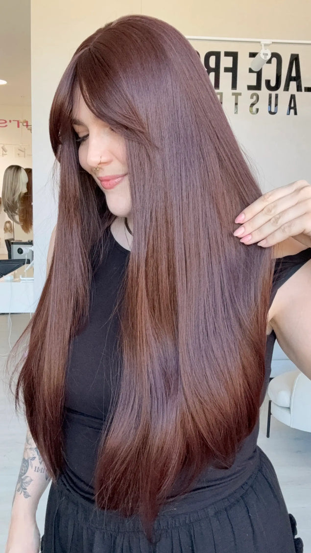 a natural looking red brunette synthetic wig with heat friendly fibres.