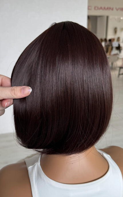back view holding bob wig, 12 inches red brunette heat safe hair
