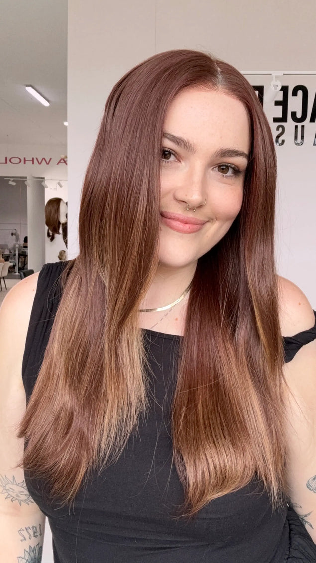 a sidfe view showing red copper straight hair with middle part and lace front, realistic hairline/ parting that can be changed. 