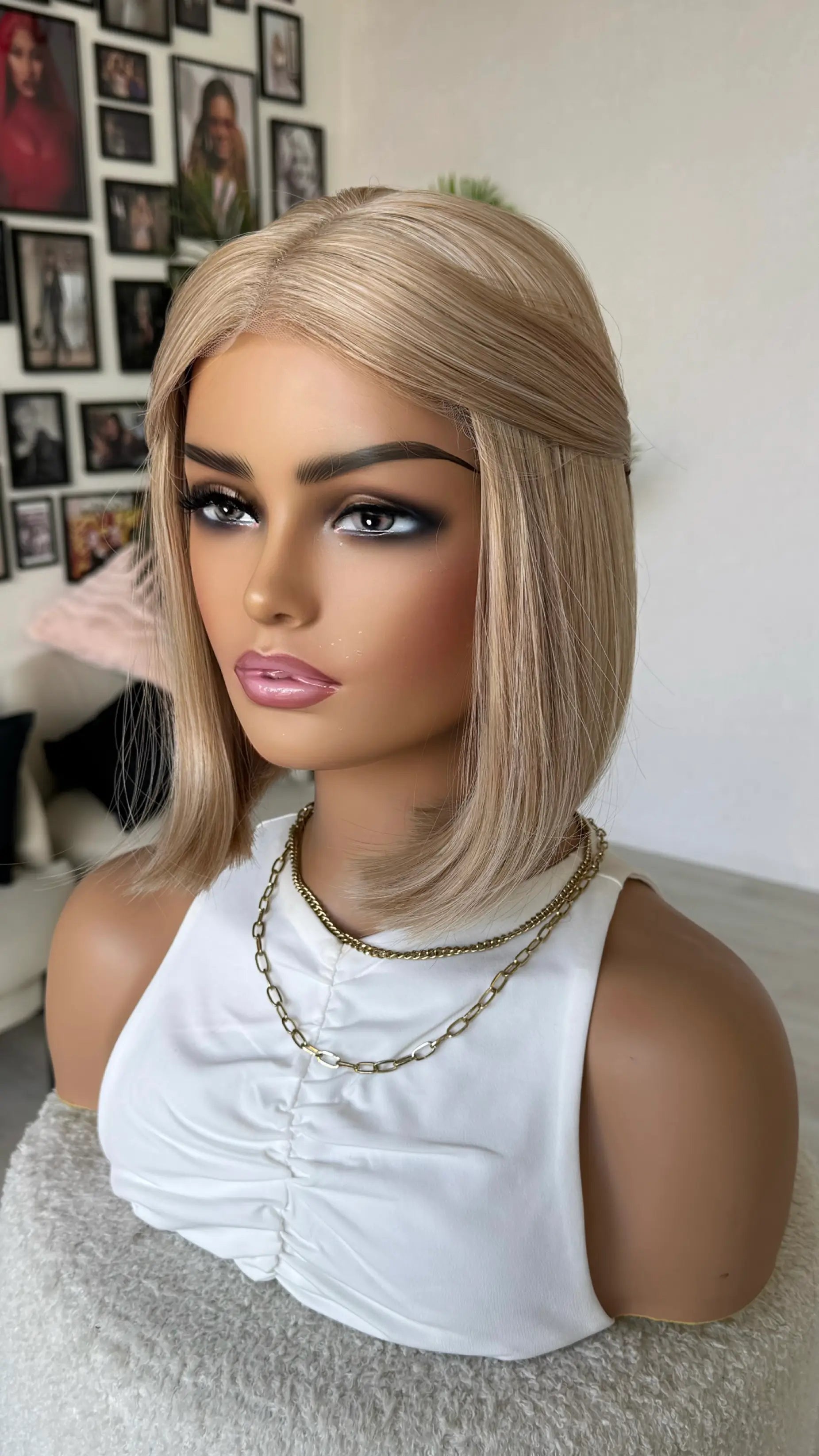heat safe hair, bob length, blonde colour with no dark root, hair tied back out of face. lace ear to ear, australia wigs