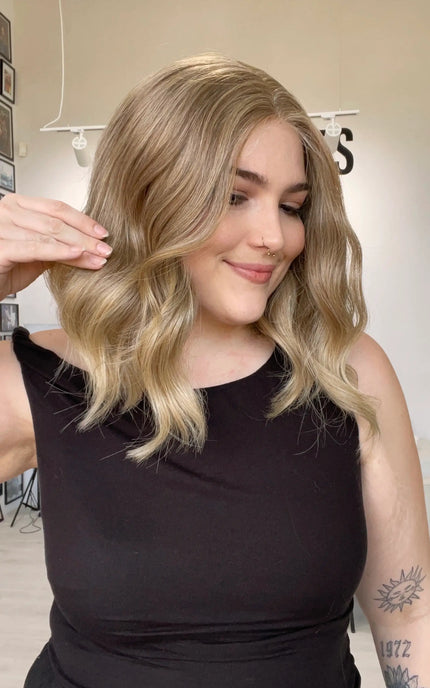 wavy blonde hair wig with middle part, glueless cap wig. gold coast australia.