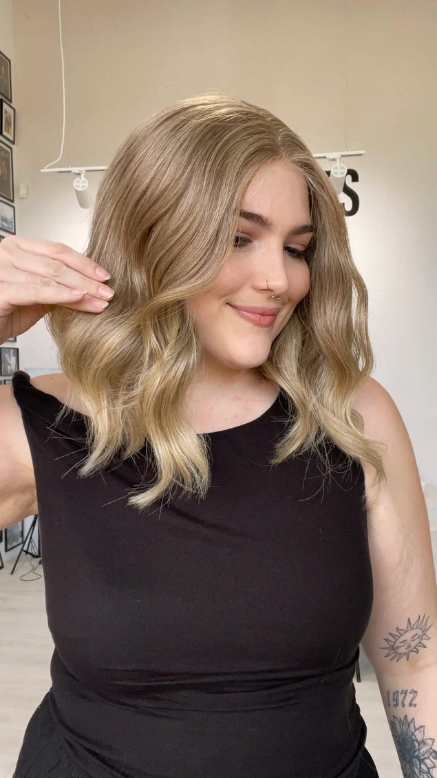 wavy blonde hair wig with middle part, glueless cap wig. gold coast australia.