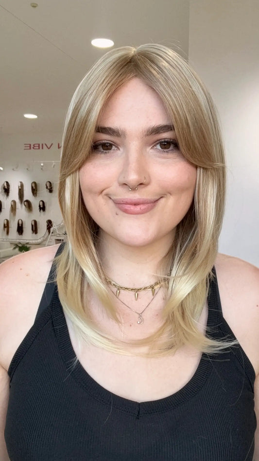 heat safe sandy blonde layered synthetic wig with middle part, glueless cap, ready to wear wigs, gold coast australlia.