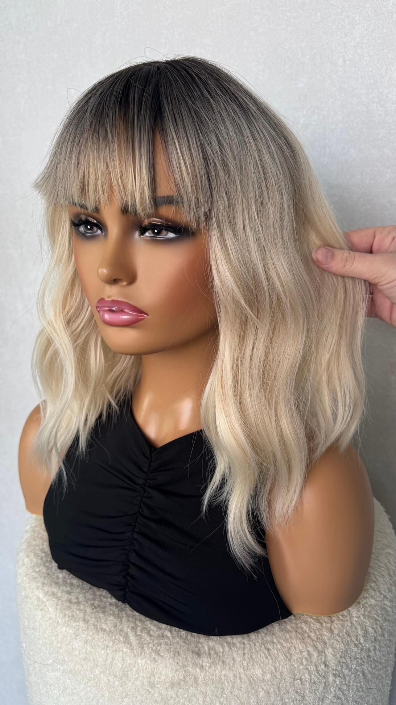 side view of platinum white blonde wig, synthetic hair, heat friendly.