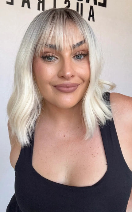 platinum blonde with dark root, fringe wavy bob wig, synthetic wig australia heat safe.