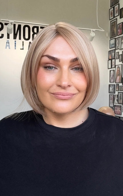 a strawberry blonde glueless bob wig with heat safe hair.