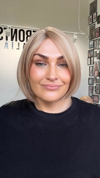a strawberry blonde glueless bob wig with heat safe hair.