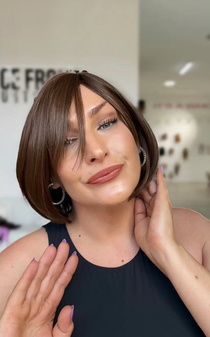 short chocolate brunette bob with long fringe that can be worn forward or to the side. easy with our glueless cap with adjsutable straps.