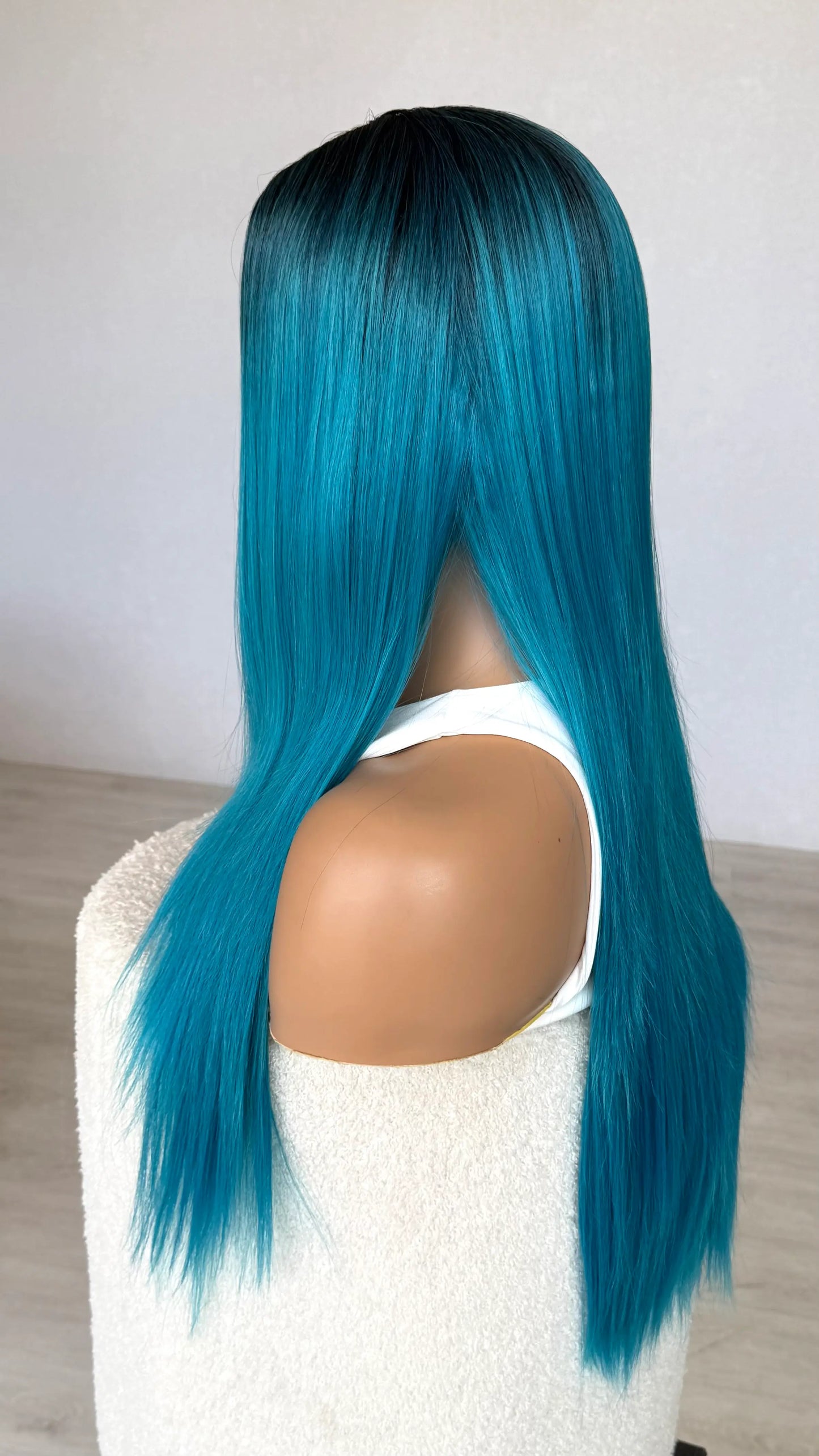 heat safe synthetic hair wig, side on view.