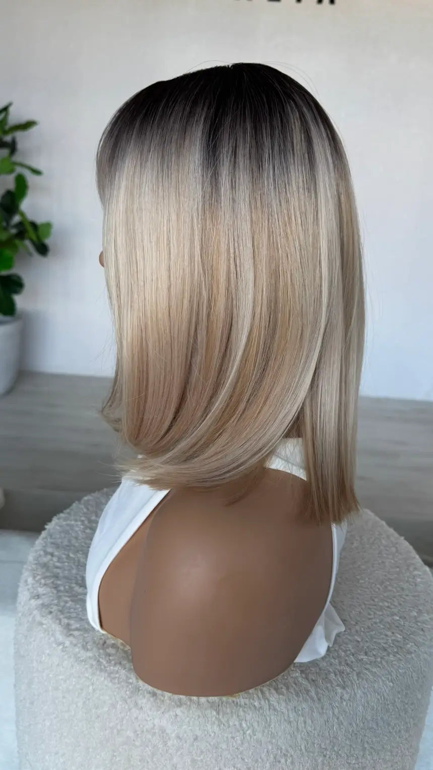 side view showing hair colours mixed blonde bob, heat safe hair.