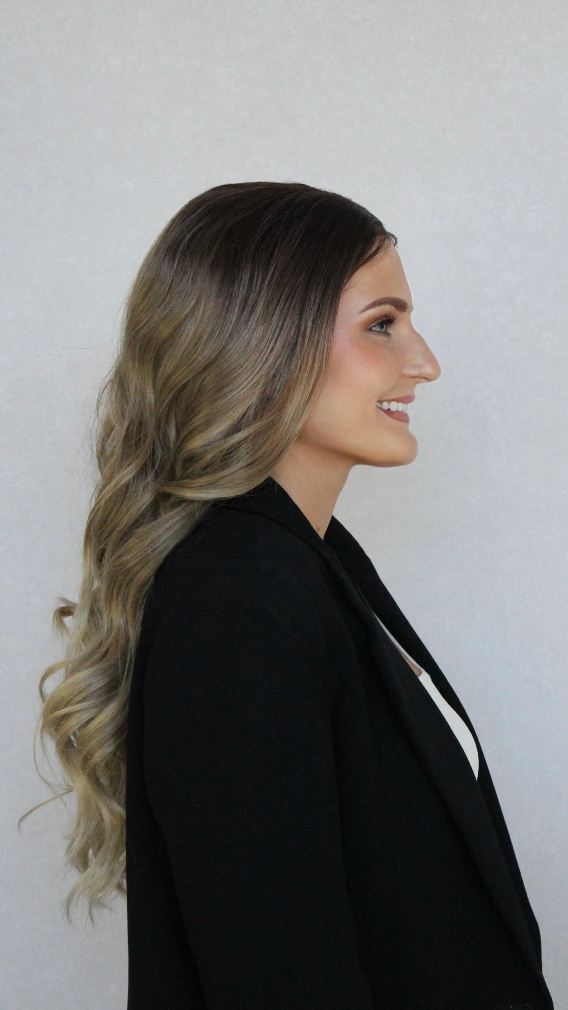 side view latte wig, dark brunette lacefront. blonde ends.