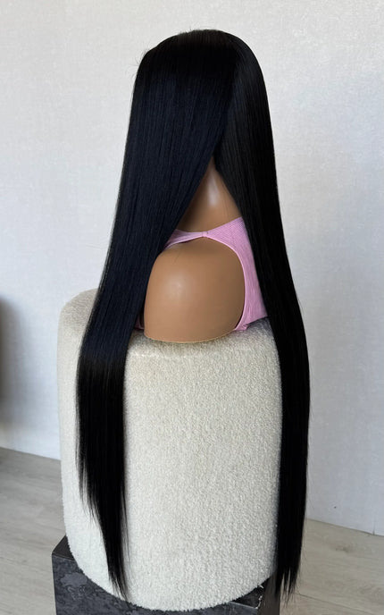 long black hair wig side on view, 28-30 inch length hair, half hair back, half forward.